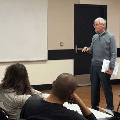 Earl Blumenauer addresses a group at PSU